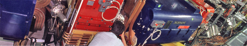 A technician works on the Antiproton Decelerator (AD) ring