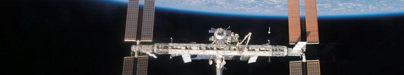 The International Space Station, on which The AMS detector will be installed (indicated by the arrow). Photo: NASA