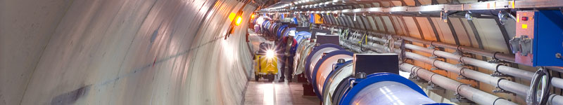 Inside the LHC tunnel. The LHC may discover 'exotic' phenomena, such as the existence of extra dimensions.